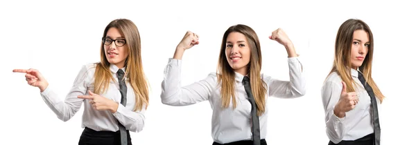 Joven mujer de negocios bonita señalando sobre fondo blanco — Foto de Stock