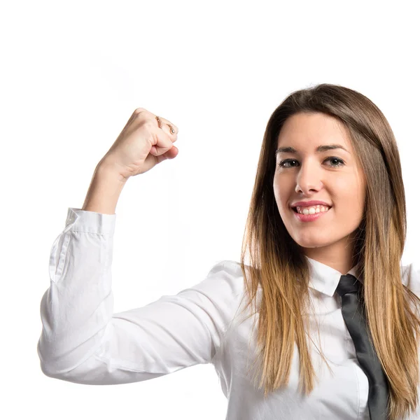 Young businesswoman winning over white background — Stock Photo, Image