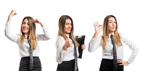 Joven empresaria ganando sobre fondo blanco — Foto de Stock