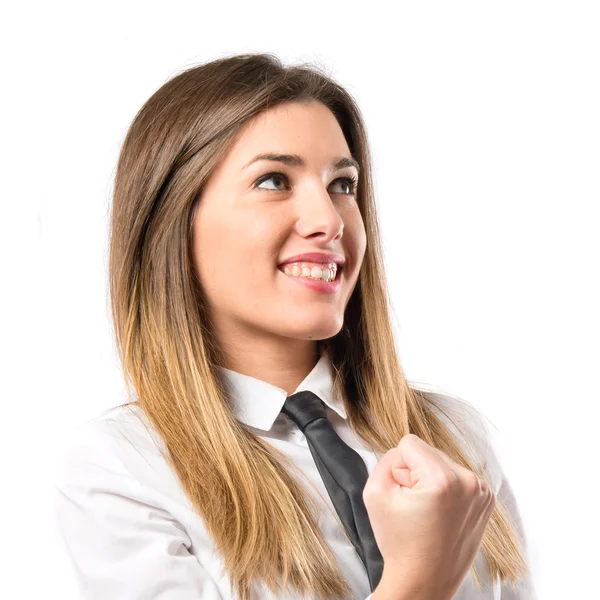 Joven empresaria ganando sobre fondo blanco —  Fotos de Stock