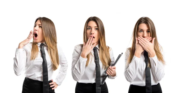 Young businesswoman doing surprise gesture over white background — Stock Photo, Image