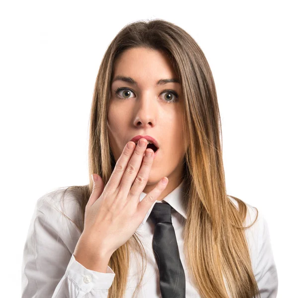 Young businesswoman doing surprise gesture over white background — Stock Photo, Image