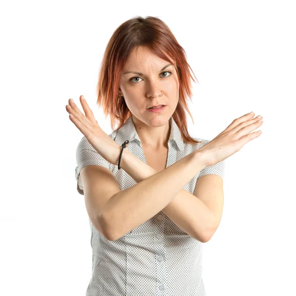 Redhead girl doing NO gesture over white background — Stock Photo, Image