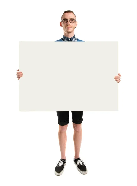 Redhead man holding an empty cardboard over white background — Stock Photo, Image