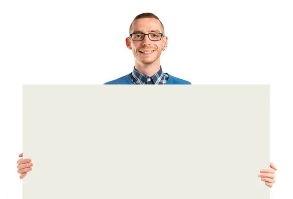 Redhead man holding an empty cardboard over white background — Stock Photo, Image