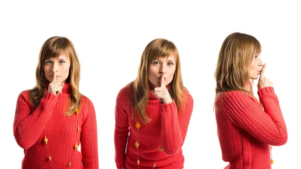 Mladá dívka dělat ticho gesto přes izolované bílé pozadí — Stock fotografie