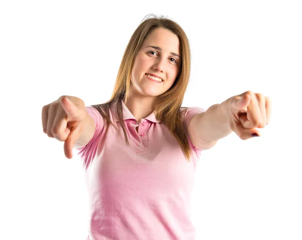 Joven bonita mujer apuntando sobre fondo blanco — Foto de Stock