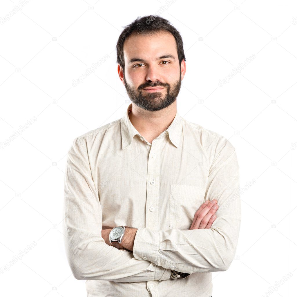 Man with his arms crossed over isolated background 