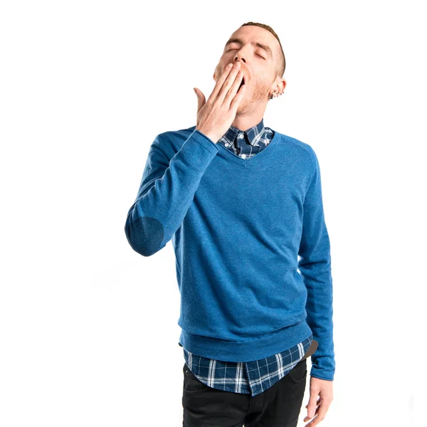 Redhead man yawning over isolated white background — Stock Photo, Image