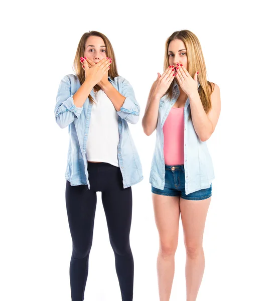 Meninas fazendo gesto surpresa sobre fundo branco — Fotografia de Stock