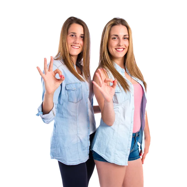 Friends making Ok sign over white background — Stock Photo, Image