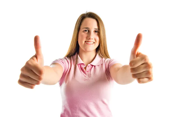 年轻的女孩制作 ok 的手势，在白色的背景 — 图库照片