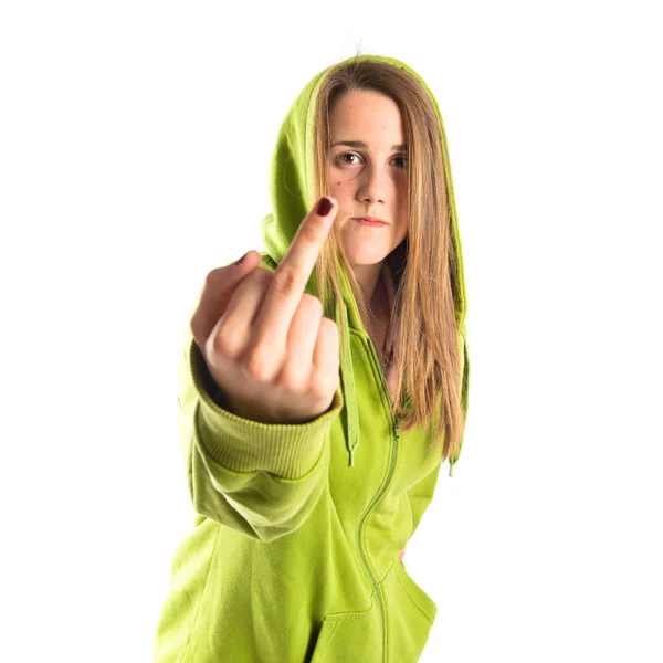 Chica seria haciendo gesto de cuerno sobre fondo blanco — Foto de Stock