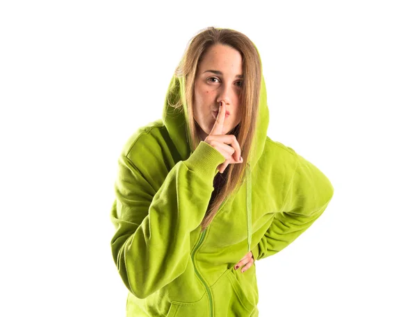 Young girl making silence gesture over isolated white background — Stock Photo, Image