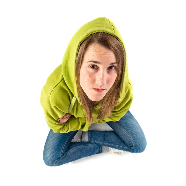 Young girl with hers arms crossed over white background — Stock Photo, Image