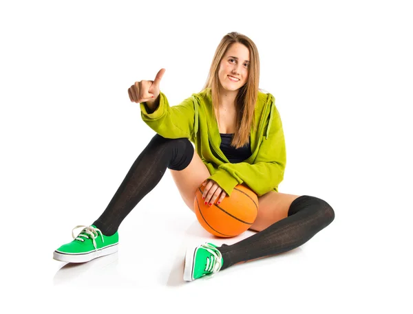 Pretty young girl wearing urban style with basketball — Stock Photo, Image