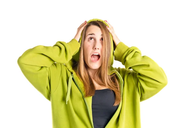 Young girl doing surprise gesture over white background — Stock Photo, Image