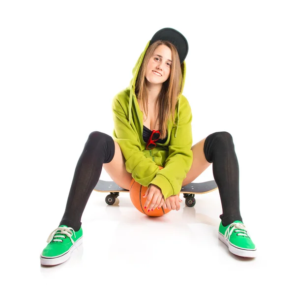 Pretty young girl wearing urban style with skateboard — Stock Photo, Image