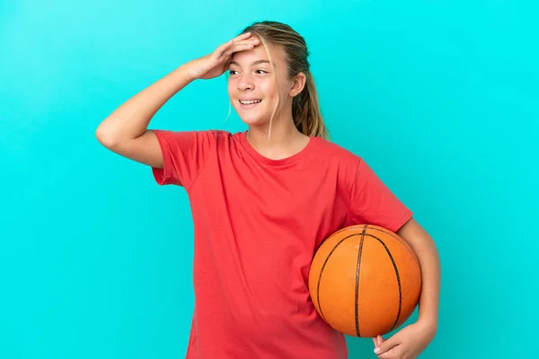 Little Caucasian Girl Playing Basketball Isolated Blue Background Smiling Lot — Stock Photo, Image