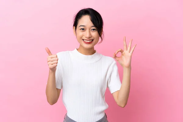Young Vietnamese Woman Isolated Pink Background Showing Sign Thumb Gesture — Stock Photo, Image