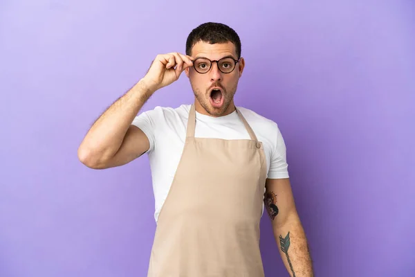 Brazilian Restaurant Waiter Isolated Purple Background Glasses Surprised — Stock Photo, Image