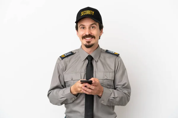 Jovem Caucasiano Segurança Homem Isolado Fundo Branco Enviando Uma Mensagem — Fotografia de Stock