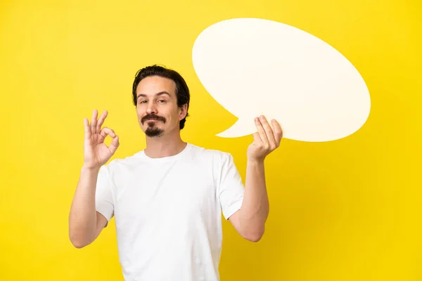 Jonge Blanke Man Geïsoleerd Gele Achtergrond Met Een Lege Spraakbel — Stockfoto