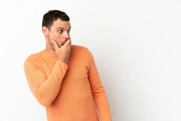 Brazilian Man Isolated White Background Doing Surprise Gesture While Looking — Stock Photo, Image