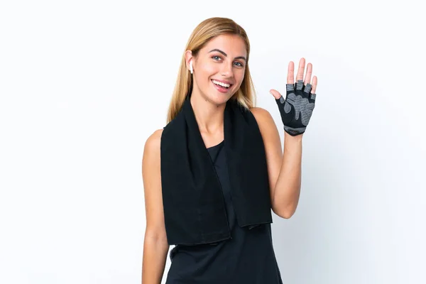 Blonde Uruguayan Sport Girl Isolated White Background Saluting Hand Happy — Stock Photo, Image