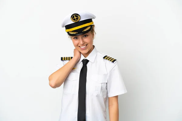 飞机上的金发女飞行员被白色背景的笑声隔离了 — 图库照片
