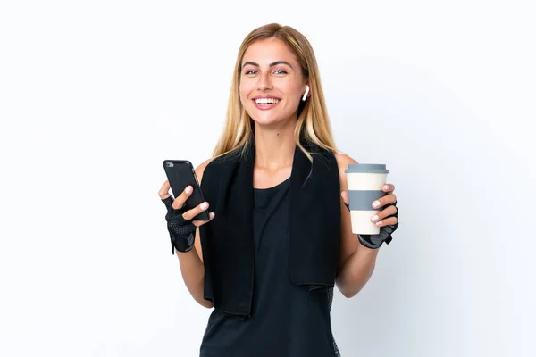 Loira Menina Esporte Uruguaio Isolado Fundo Branco Segurando Café Para — Fotografia de Stock