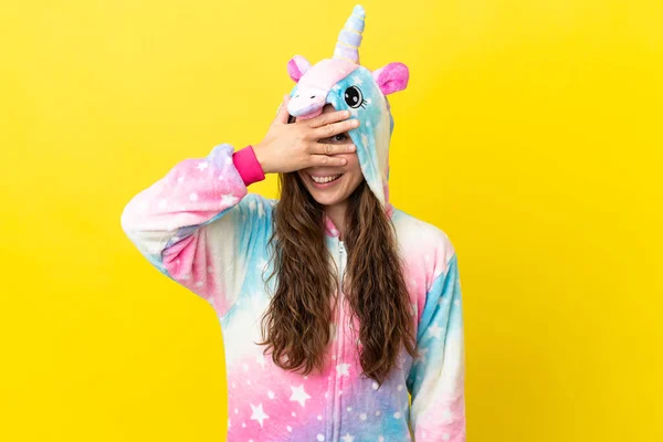 Girl Unicorn Pajamas Isolated Background Covering Eyes Hands Smiling — Stock Photo, Image