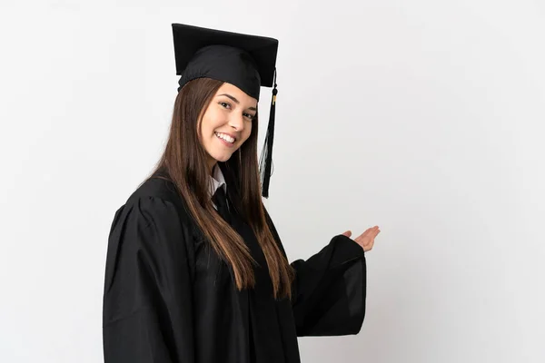 Adolescente Graduado Universitario Brasileño Sobre Fondo Blanco Aislado Extendiendo Las —  Fotos de Stock