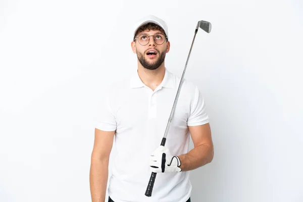 Guapo Joven Jugando Golf Aislado Sobre Fondo Blanco Mirando Hacia —  Fotos de Stock