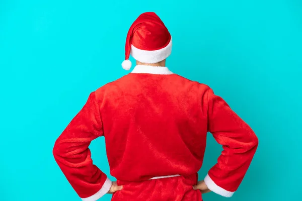 Joven Disfrazado Santa Claus Aislado Sobre Fondo Azul Posición Trasera — Foto de Stock