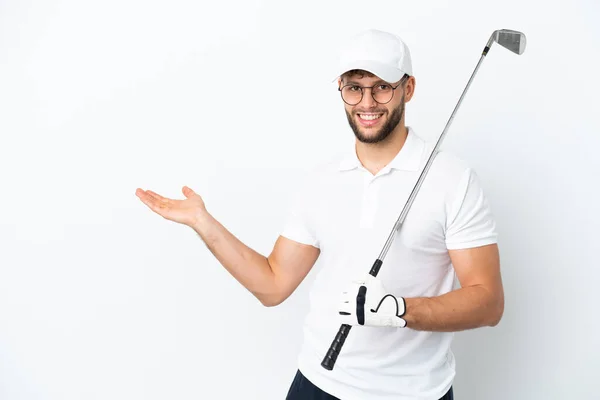 Guapo Joven Jugando Golf Aislado Sobre Fondo Blanco Extendiendo Las —  Fotos de Stock