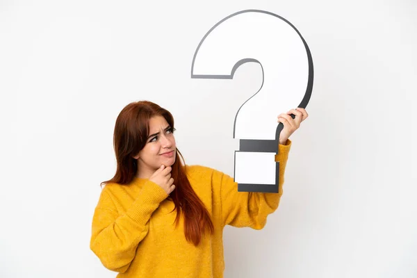 Young Redhead Woman Isolated White Background Holding Question Mark Icon — Stock Photo, Image
