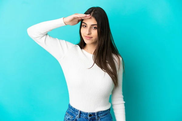 Young Caucasian Woman Isolated Blue Background Saluting Hand Happy Expression — Stock Photo, Image