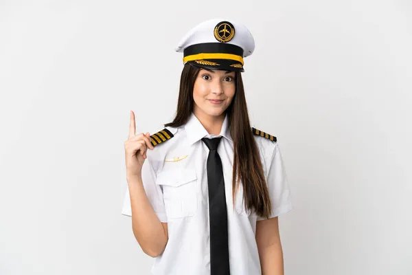 巴西女孩飞行员用食指在孤立的白色背景上指指点点是个好主意 — 图库照片