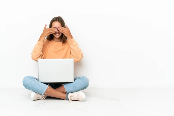 Young Woman Laptop Sitting Floor Covering Eyes Hands — Stock Photo, Image