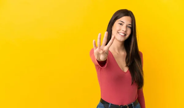 Adolescente Brasileña Chica Sobre Aislado Amarillo Fondo Feliz Contando Cuatro —  Fotos de Stock