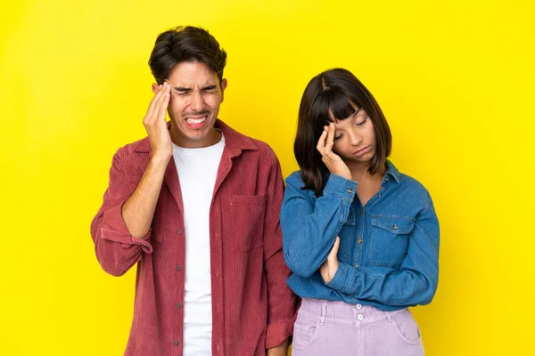 Young Mixed Race Couple Isolated Yellow Background Unhappy Frustrated Something — Stock Photo, Image