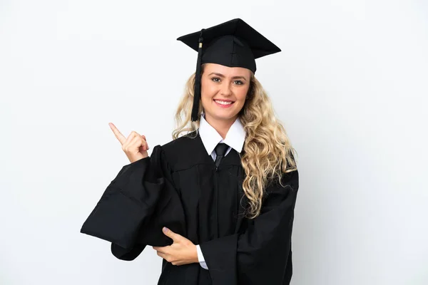 Νεαρή Απόφοιτος Πανεπιστημίου Γυναίκα Απομονωμένη Λευκό Φόντο Δείχνοντας Δάχτυλο Στο — Φωτογραφία Αρχείου