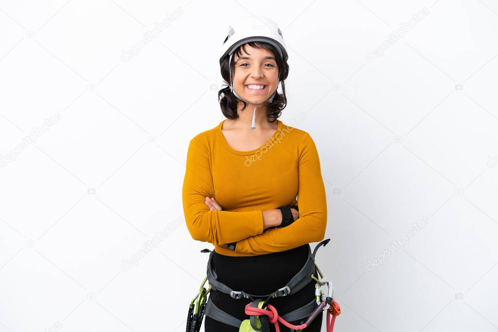 Young woman rock-climber woman isolated on white background keeping the arms crossed in frontal position