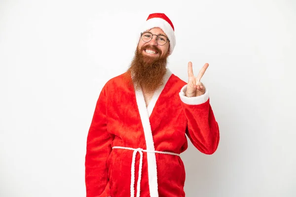 Красноватый Человек Замаскированный Санта Клауса Изолированный Белом Улыбаясь Показывая Знак — стоковое фото