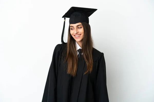 Νεαρός Απόφοιτος Πανεπιστημίου Απομονωμένος Λευκό Φόντο Κοιτάζοντας Στο Πλάι Και — Φωτογραφία Αρχείου