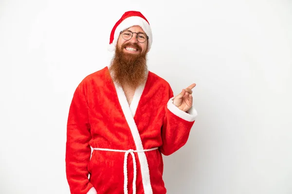 Reddish Man Disguised Santa Claus Isolated White Pointing Finger Side — Stock Photo, Image