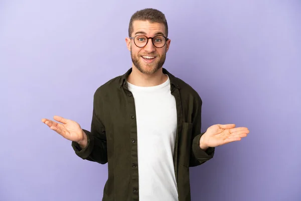 Young Handsome Caucasian Man Isolated Purple Background Shocked Facial Expression — Stock Photo, Image