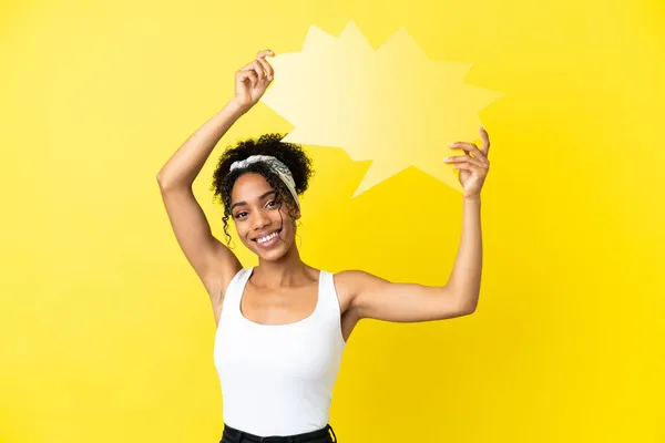 Young African American Woman Isolated Yellow Background Holding Empty Speech — Stock Photo, Image