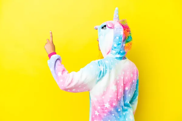 Girl Curly Hair Wearing Unicorn Pajama Isolated Yellow Background Pointing — Stock Photo, Image